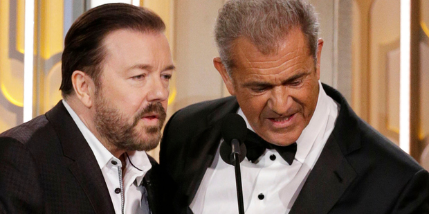 Ricky Gervais and Mel Gibson during their awkward exchange at today's Golden Globes ceremony. Photo/Getty