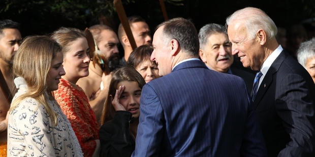 John Key and Joe Biden chat to guests at Government House. Photo / Greg Bowker