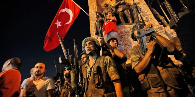 Turkish soldiers secure the area, as supporters of Turkey's President Recep Tayyip Erdogan protest in Istanbul's Taksim Square. Photo / AP