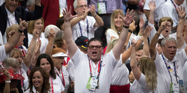 Members of the Florida delegation cheer for Republican presidential candidate Donald Trump. Photo / AP