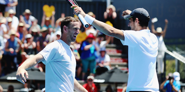 Michael Venus celebrates with Mate Pavic after winning the doubles final at the ASB Classic. Photo / Getty Images