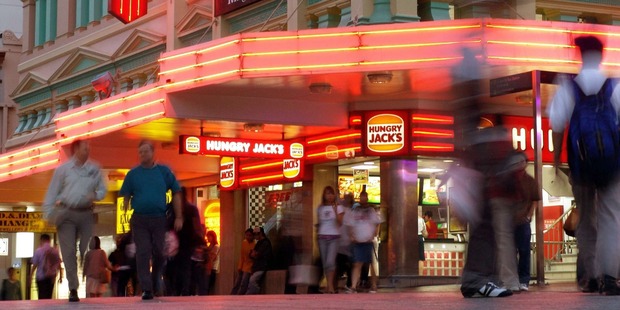 Officers were called after the body was discovered in a locked cubicle at the Hungry Jack's. Photo / Getty Images