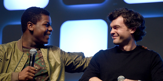 Star Wars actor John Boyega, left, with Alden Ehrenreich, who will play Han Solo in an origins movie about the intergalactic space smuggler. Photo/Getty
