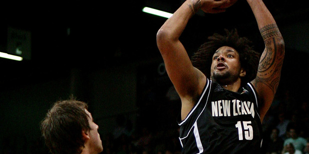 BJ Anthony of the Tall Blacks shoots during a game against Australia. Photo / Getty Images