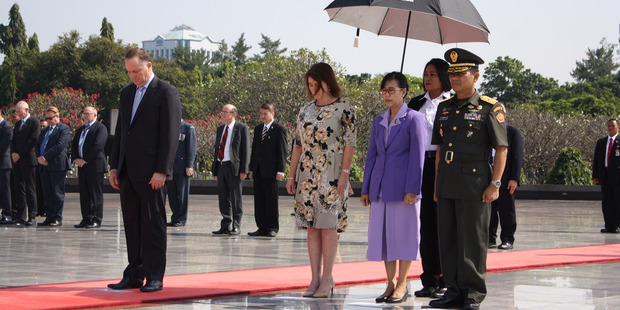 John and Bronagh Key pay respects at Kalimata Cemetery in Jakarta. Photo / Isaac Davison