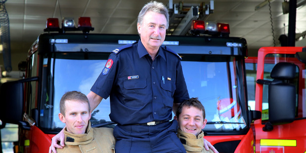Retiring firefighter John Massey, centre, with his workmates Glenn Haden, left, and Jason Rattray. PHOTO/STUART MUNRO