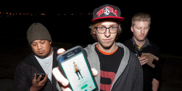 Caymen Beeby is travelling the length of NZ catching pokemon. (l-r) Ce Crew, Caymen Beeby, and Lucas Finucane. PHOTO/ANDREW WARNER