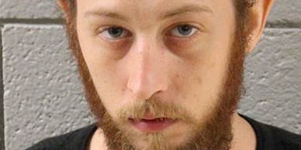 Joshua Lee Long is accused of spraying fluid used to embalm a human brain on marijuana before smoking it. Photo / AP