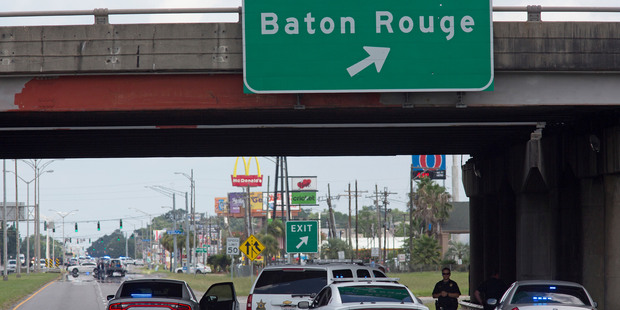 Baton Rouge Police block Airline Highway after police were shot. Photo / AP