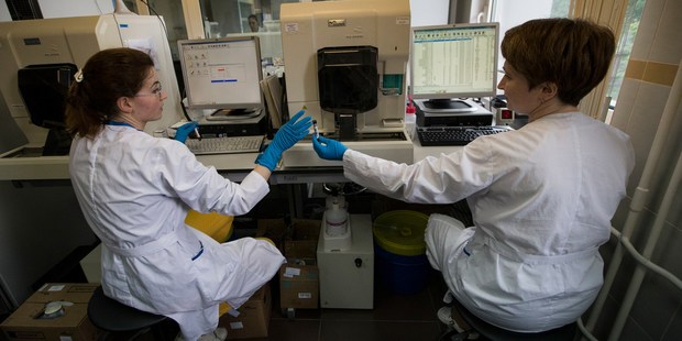Employees work in Russia's national drug-testing laboratory in Moscow, Russia. Photo / AP