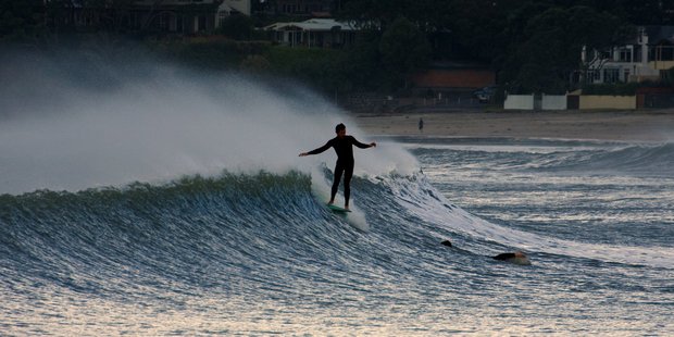 Gale force westerly winds raised the surf at Takapuna Beach last month. Photo / Paul Estcourt