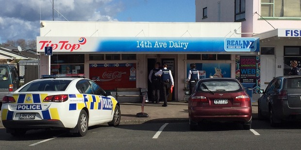 Police respond to reports of a robbery at 14th Ave Dairy in Tauranga. Photo/George Novak