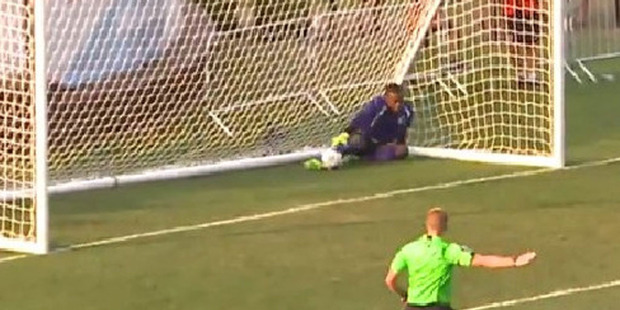 Sammy Ndjock retrieves the ball from the back of his own net. Photo / Twitter.