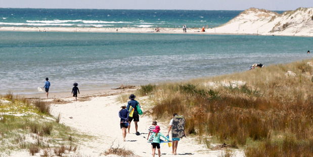 Holidaymakers make the most of their summer break at Ruakaka Beach. Photo / Tania Whyte