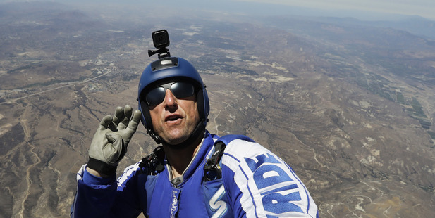 Skydiver Luke Aikins will leave his chute in the plane when he bails out 25,000 feet over Simi Valley. photo / AP