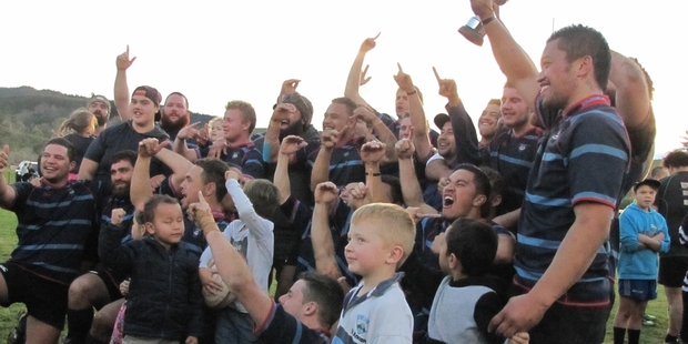 Players and young fans celebrate in the spirit of whanaungatanga and manaakitanga after Eskview's 31-29 Hawke's Bay second division rugby final win over Otane at Otane Domain, less than a year-and-a-half after Eskview almost went into recess because of a shortage of players and officials. Photo / Doug Laing