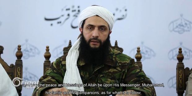 An image grab taken from a video broadcast on by Dubai-based Orient News satellite television shows the head of Al-Nusra Front in Syria, Abu Mohamad al-Jolani.