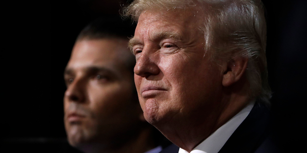 Republican presidential nominee Donald Trump, right, and his son Donald Trump, jnr. Photo / AP