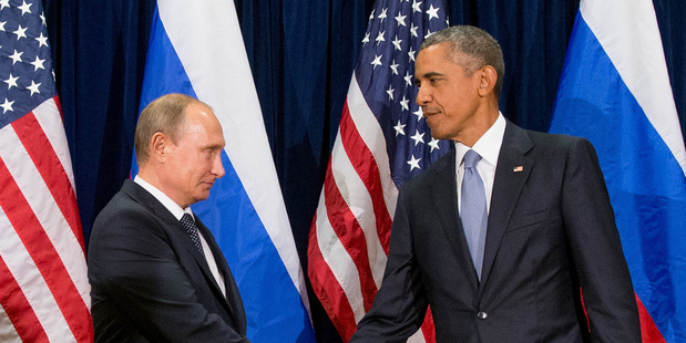 US President Barack Obama shakes hands with Russian President President Vladimir Putin during a meeting last year. Photo / AP