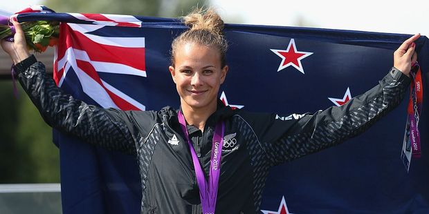 Lisa Carrington celebrates after winning the Gold medal at the London Olympics. Photo / Getty