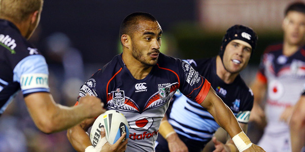 Thomas Leuluai of the Warriors makes a break against the Sharks. Photo / Getty Images