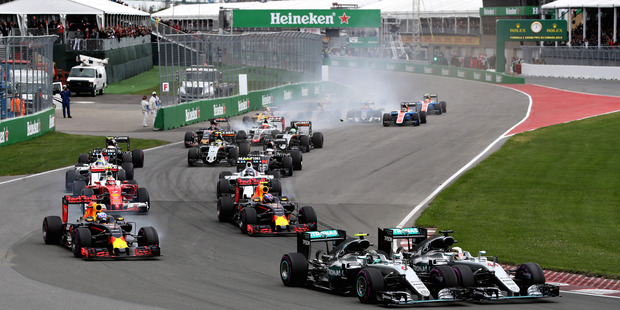 Nico Rosberg and Lewis Hamilton lead the F1 pack at the Canadian Grand Prix. Photo / Getty Images