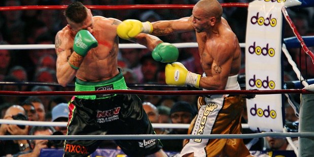 Anthony Mundine (right) throws a punch towards Danny Green during their fight in 2006. Photo / Getty Images