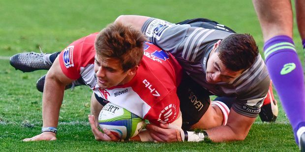 The Lions' Rohan Janse van Rensburg scores a try during their quarter-final against the Crusaders. Photo / Getty