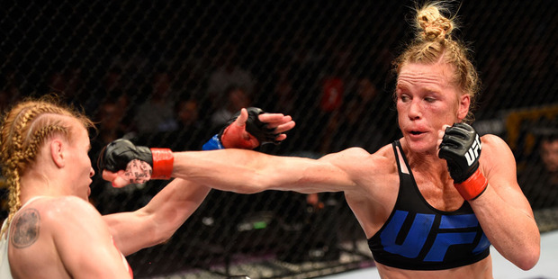 Valentina Shevchenko jabbing Holly Holm at UFC Fight Night in Chicago. Photo / Getty