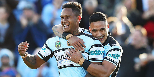 Ben Barba of the Sharks celebrates with teammate Valentine Holmes. Photo / Getty