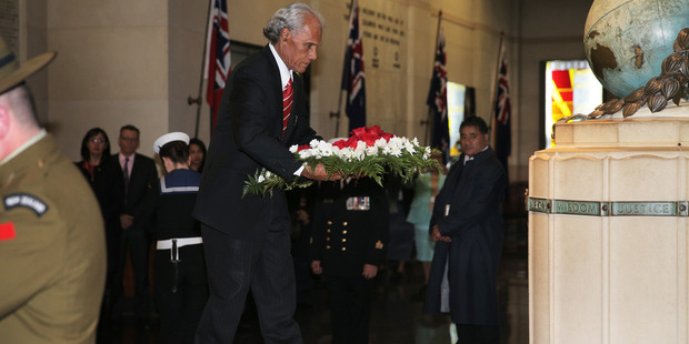 Tongan Prime Minister Samuela 'Akilisi Pohiva lays a wreath at the Auckland War Memorial Museum today. Photo / Doug Sherring