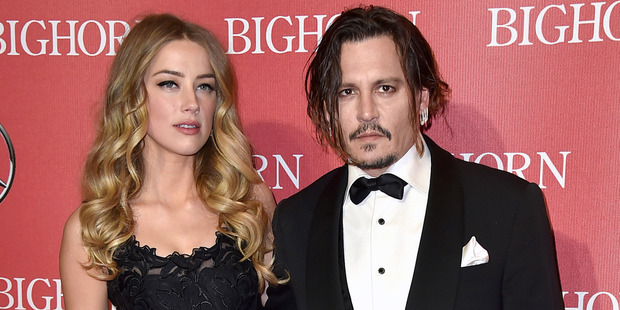 Amber Heard and Johnny Depp. Photo / AP