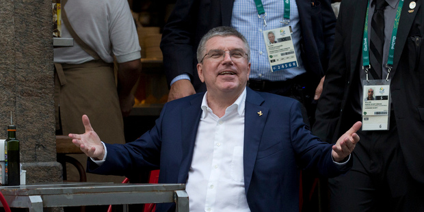 Tomas Bach, president of the International Olympic Committee, sitting at a traditional bar-restaurant in Rio de Janeiro, Brazil. Photo / AP