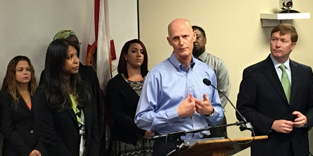 Florida Gov. Rick Scott speaks at a news conference in Florida where he announced that the state likely has the first cases of Zika transmitted by mosquitoes on the US. Photo / AP
