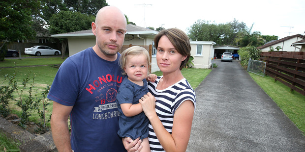 Ben Grimer and Anna Macky, with Jessica, 2, say they would not have bought in Panmure had they known how the area was going to be rezoned. Photo / Getty Images