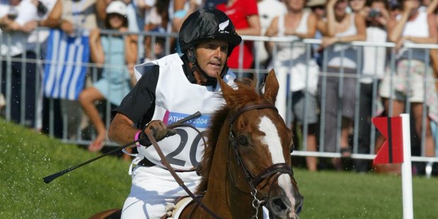 Blyth Tait and his best-known mount Ready Teddy, pictured at the Athens Olympics in 2004, restored New Zealand's place at the top of the eventing world with gold in Atlanta. Photo / Mark Mitchell
