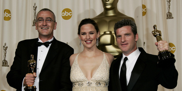 Actress and presenter Jennifer Garner, center, poses with Mike Hopkins, left, and Ethan Van der Ryn. Photo: NZPA/AP, Kevork Djansezian