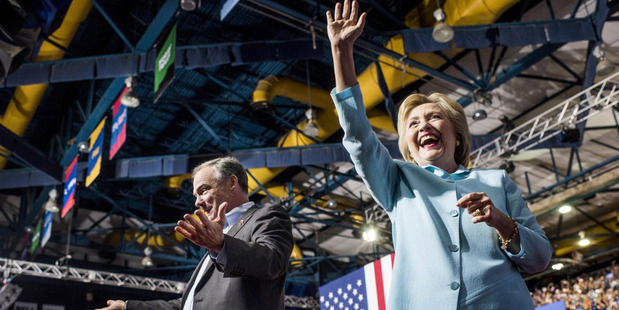 Tim Kaine and presumptive Democratic presidential nominee Hillary Clinton during a rally in Miami. Photo / Washington Post photo by Melina Mara