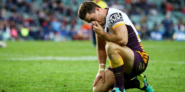 Ben Hunt of the Broncos looks dejected during the round 21 NRL match between the Sydney Roosters and the Brisbane Broncos. photo / Getty