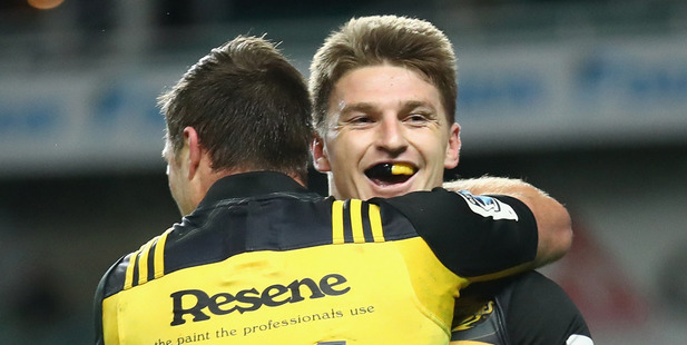 Cory Jane, left, has been Mr Invisible this season while the likes of Beauden Barrett, right, and Julian Savea have led the headlines. Photo / Getty