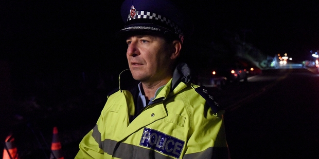 Western Bay police area commander Inspector Clifford Paxton at the crash scene on Tuesday night. Photo / George Novak