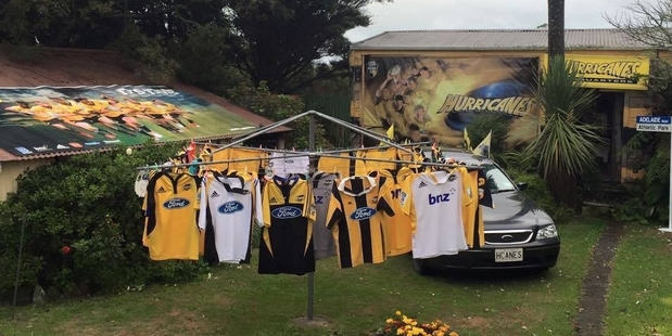 The Taranaki backyard of Hurricanes supporter-in-chief Craig Werder is jammed with signs, banners and team jerseys. Photo / Facebook