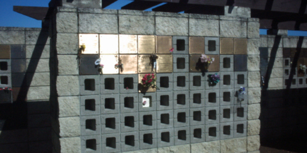 Approximately 20 bronze plaques were stolen from Paparoa Howick Cemetery. Photo / Supplied via Auckland Council
