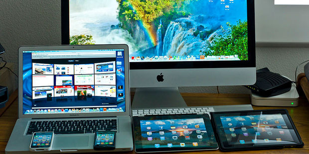 Apple is notable for controlling both the hardware and the software on its iPhones, iPads and Macs. Hardware has always been the main driver for the company. Photo / Getty Images