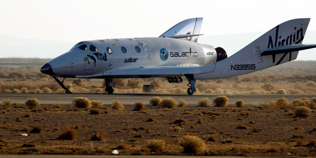 Virgin Galactic's SpaceShipTwo, the world's first commercial spaceline, lands at Moojave airport after a successful flight. Photo / Getty Images