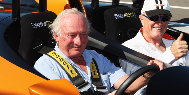 Former Formula One driver Chris Amon sits at the wheel of the Hulme Super Car. Photo / Getty Images