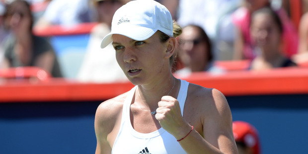 Romania's Simona Halep reacts after winning a point against Madison Keys. Photo / AP