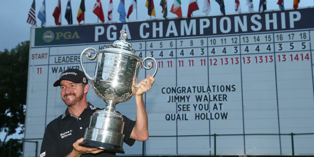 Jimmy Walker poses with the trophy after winning the PGA Championship. Photo / AP