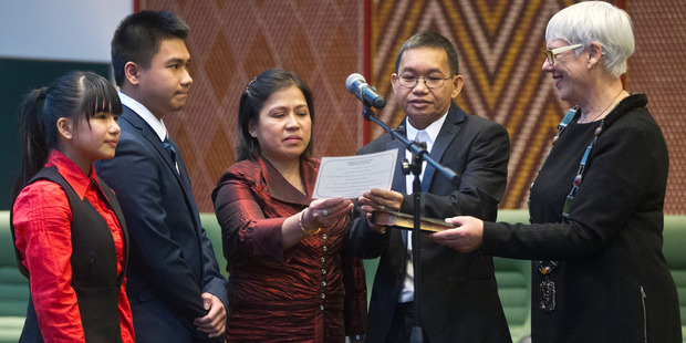 The Paras family from the Phillipines were made New Zealand citizens. From left are Kristia, Kent, Evelyn and Ferdinand with Rotorua mayor Steve Chadwick. PHOTO/STEPHEN PARKER