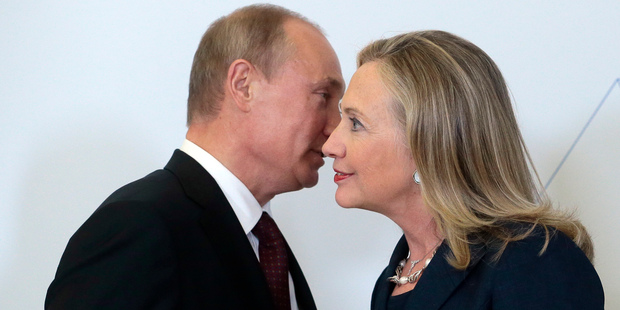 In this file photo taken on in September 2012, Russian President Vladimir Putin, left, meets US Secretary of State Hillary Clinton in Vladivostok, Russia. Photo / AP